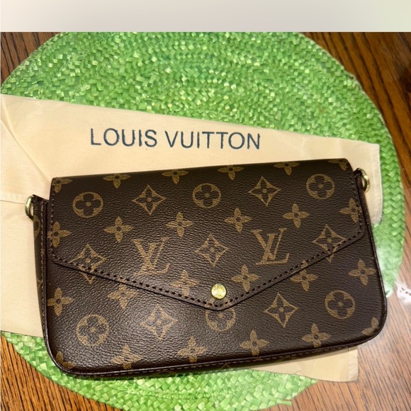 Louis Vuitton Monogram Clutch in Brown - Picture 1 of 3